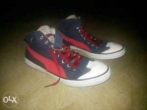 Red And Black Puma High Tops Sneakers