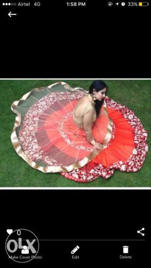 Red flayered lehenga with golden high low choli,