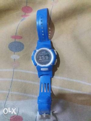 Round Blue Digital Watch With Blue Rubber Band
