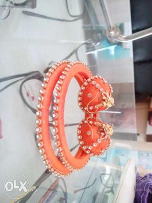 Two Orange Silk Thread Bangles And Jhumka Earrings