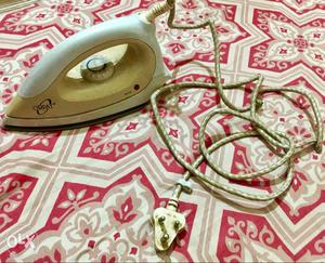 White And Beige Clothes Flat Iron