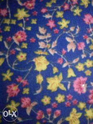 Blue, Yellow, And Pink Floral Printed Textile