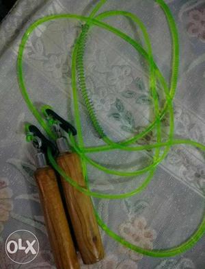Brown Handled Green Skipping Rope
