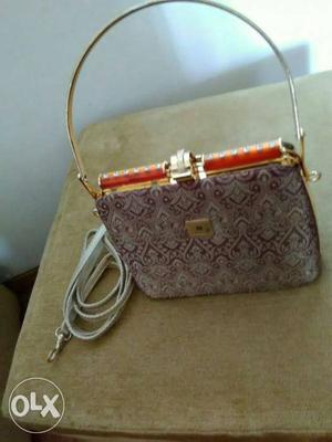 Designer bag dual tone gold and Maroon for sale