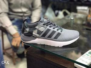 Gray, Black, And White Adidas Low Top Sneaker