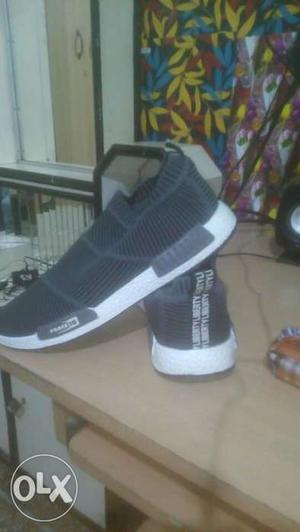 Pair Of Black-and-white Athletic Shoes liberty orignal one