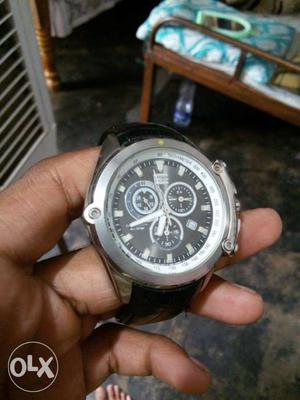 Round Silver Bezel Chronograph Watch With Black Leather