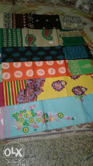 Six Blue, Brown, Orange, And Yellow Floral Textiles