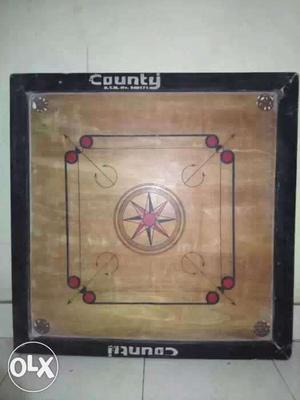 Small size Carrom board 4-5 month old I want to