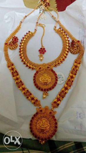 Two Gold And Red Necklaces
