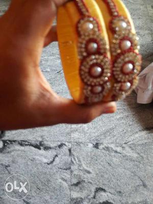 Two Yellow And Red Bangle Bracelets