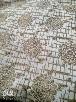 White And Beige Floral Textile
