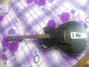 Black And Brown Electric Acoustic Guitar