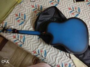 Blue And Black Acoustic Guitar