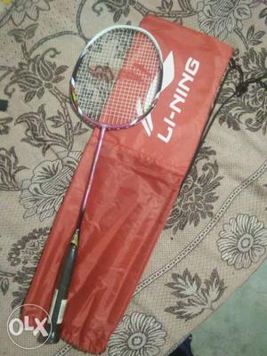Purple And White Li-Ning Badminton Racket.