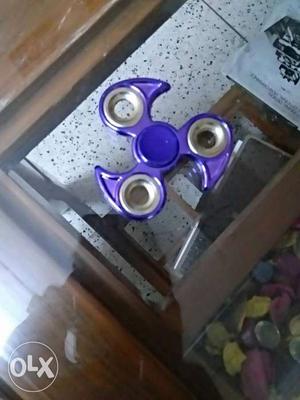 Purple metal blade spinner duration is 3 min plus