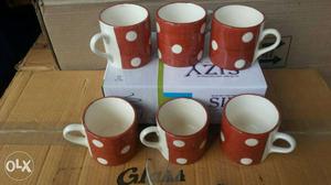 Six Red-and-white Ceramic Mugs With Box