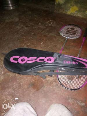 Two Black-and-pink Cosco Badminton Rackets With Case