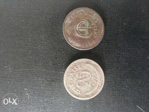 Two Gray Round Coins