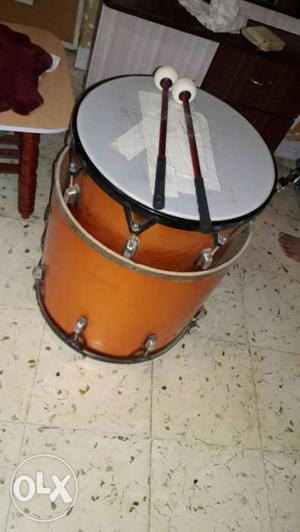 Two Orange Marching Drums With Mallets