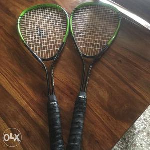 Two squash raquets, hardly used, in a almost new