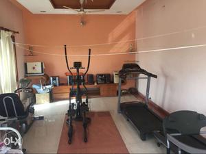 Two treadmills, one cross walker, one bicycle all