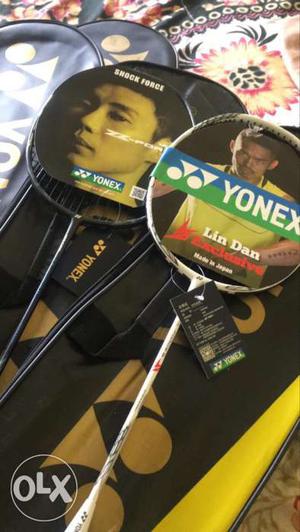 White And Black Yonex Badminton Rackets