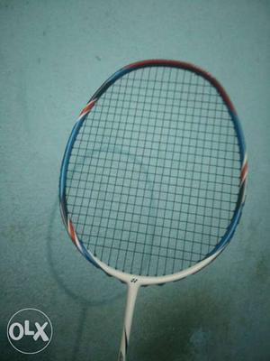 White And Blue Badminton Racket