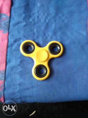 Yellow colour hand spinner