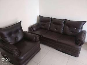 8 seater brown leather Sofa..two 3 seater and 2 one seater.