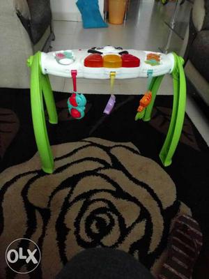 Baby's White And Green Plastic Activity Table