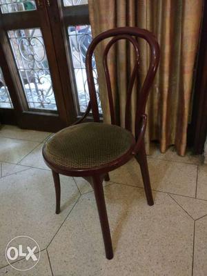 Brown Metal Framed Brown Fabric Padded Armless Chair