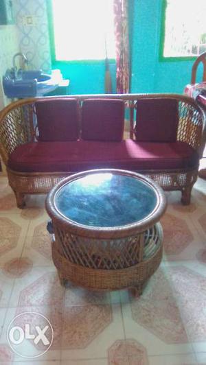 Brown Rattan Padded Sofa With Coffee Table