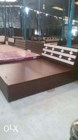 Low cost wooden BED with storage.