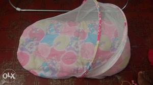 Pink And Teal Floral Carry Cot