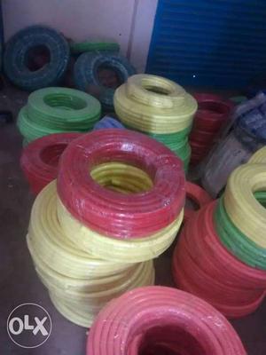 Red, Yellow, Green, And Blue Rubber Hoses