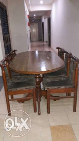Solid Saal wood dining table with six chairs