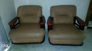 Two Brown Leather Armchairs