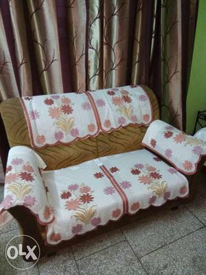 White And Brown Floral Sofa