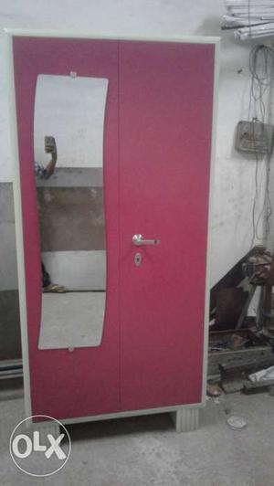 White And Pink Wooden Wardrobe With Mirror