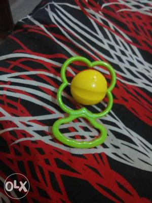 Yellow And Green Plastic Toy