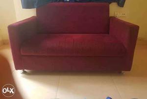2 seater couch available along with 2 cushions of