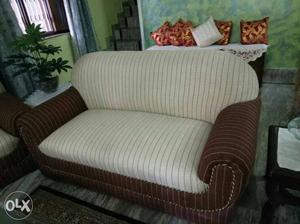 3 Beige Fabric Sofa and a couch