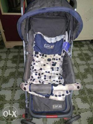 Baby's White, Black, And Gray Luv Lap Stroller