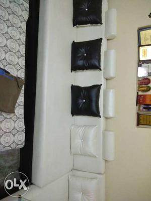 Black And White Leather Sectional Sofa And Throw Pillows