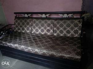 Black Metal Framed Gray And Brown Floral Padded Sofa