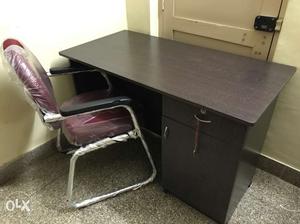 Black wooden computer table and chair