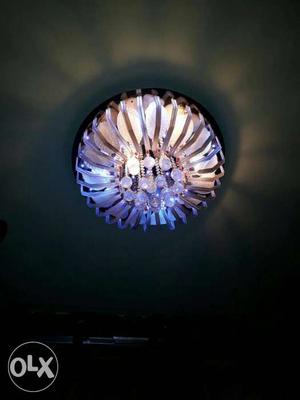Blue & yellow Downlight Chandelier. Its 2 years