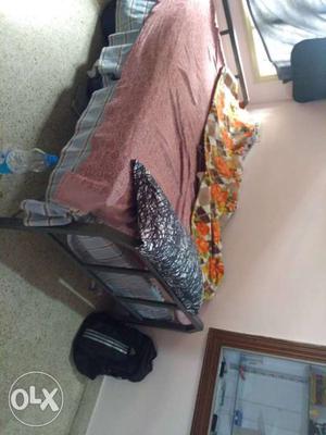 Brand new metal 7*4 ft bed with mattress