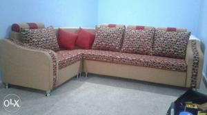 Brown And Red Sectional Sofa With Throw Pillows